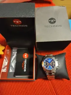 TECHNOS クォーツ腕時計 青金 - メルカリ
