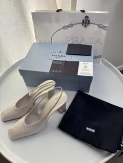 PRADA ゴールド スリングバックパンプス - メルカリ
