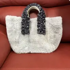 【TSL / Trysil】ハンドルフリルエコファーバッグ