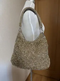 可愛いアクセ付きアンテプリマの薄ゴールドの肩がけショルダー - メルカリ