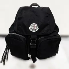 ほぼ未使用 モンクレール バッグパック DAUPHINE ロゴ総柄 タッセル 美品☆モンクレール DAUPHINE LARGE リュック ロゴ 総柄 タッセル