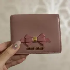 MIUMIU レザー ピンク リボン レディース 2つ折り財布のサムネイル