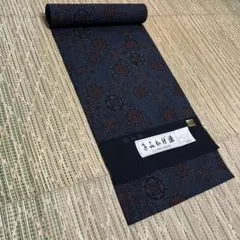 【新品未使用】きみかげ染紬＜織柄・幾何学花絣文・塚本謹製＞着尺　ウール化繊混紡のサムネイル