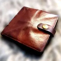 IL BISONTE 人気の二つ折り財布 本革 飴色エイジング ヌメ革