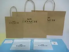 【COACHの紙袋（3枚）、ポーチ（2個）＋FolliFollieの紙袋】
