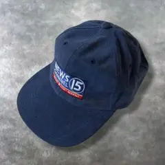 vintage 90s USA企業ロゴNEWS15刺繍キャップ 紺Y2K古着のサムネイル