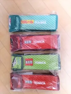 新品未使用トミカプラレールペットボトルケース4個おまけトーマスエッグチョコシール