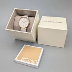 【未使用◆電池新品】マイケルコース レディース腕時計 石付き 白革ベルト 箱付