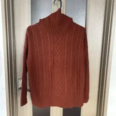 オレンジ色のアクリルニットセーターのサムネイル