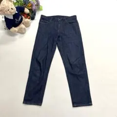 ユニクロ ボーイフレンドテーパードジーンズ ダークブルー 25 M