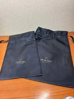 clé de peau ネイビー巾着ポーチ　2点セット　クレドポー　非売品のサムネイル