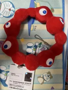 ミャクミャク カバンに付けられるぬいぐるみ ロゴマーク
