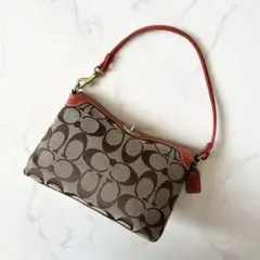 コーチ シグネチャー アクセサリーポーチ ワンショルダー ターンロック ベージュ