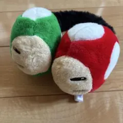 スーパーニンテンドーワールド きのこぬいぐるみ 赤 緑　イヤーマフ