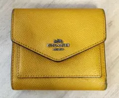 COACH 三つ折り財布 イエロー