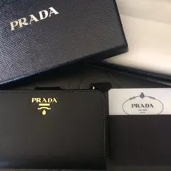 新品未使用PRADA プラダ サフィアーノレザー折長財布ラウンドジップ ミニ黒
