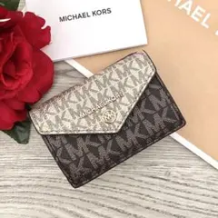 《新品未使用》MICHAEL KORS 折り財布　レザー ゴールド 三つ折り財布