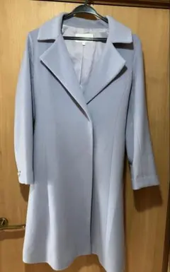 プロポーションボディドレッシング　水色のロングコート ベルト付き
