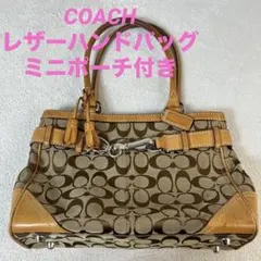 COACH 総柄 ハンドバッグ ベルトライン シグネチャー タッセル 手さげ