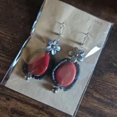癖強 オレンジ花ピアス
