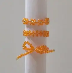 ビーズリング 花 リボン オレンジ×ゴールド アクセサリー フラワー 橙色