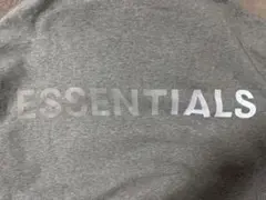 ESSENTIALS グレー フード付きパーカー