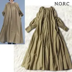 ノーク ロングワンピース カーキベージュ 長袖 ゆったり ギャザー フレア 秋冬