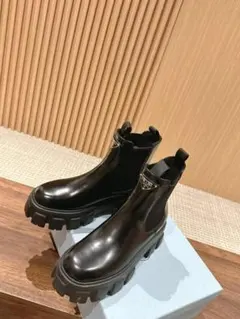 PRADA プラダ ロゴムートンボアブーツ シューズ 1D245N - メルカリ