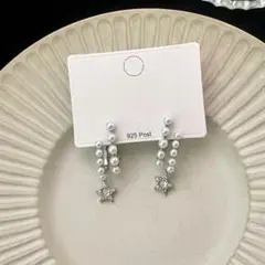 パールとラインストーン星モチーフピアス 揺れる 夢かわ フェミニン レディース