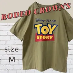 ⭐︎良好⭐︎ロデオクラウンズ　トイストーリー　半袖Tシャツ　レディースＭ　カーキのサムネイル