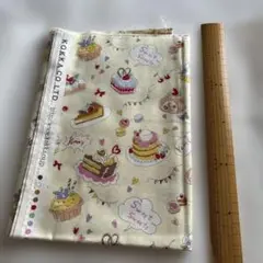 KOKKA スイーツ柄 綿プリント生地 薄イエロー　110cm×50cm