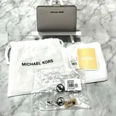 未使用品✨マイケルコース JET SET TRAVEL ２つ折りグレー タグ付