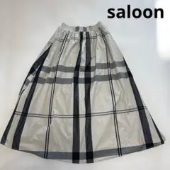 saloon チェック柄フレアロングスカート