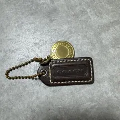 COACH ロゴチャーム タグ 60 ブラウン