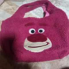 ロッツォ顔デザインのバッグ
