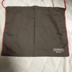 COACH　布製　バッグ保管袋 ブラウン　赤縁取り