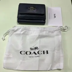 お値下げ【極美品　ほぼ新品】COACH ネイビー 三つ折り財布 保存袋付き