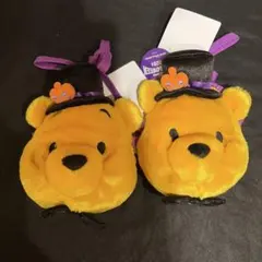 プーさんハロウィンパスケース2つ