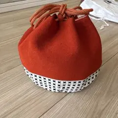 オレンジ色の和装用バッグ