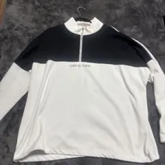 LYRICAL VERSE ハーフジップ トレーナー