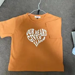 PINKlatteの少し暗めのオレンジ の半袖。