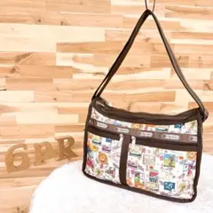 ハワイ限定【レスポートサック】アロハ 切手柄 ショルダーバッグ 総柄 ピンク×茶