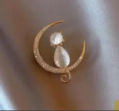 【送料無料】パールブローチ 猫　かわいい プレゼント キラキラ 小物 フォーマル