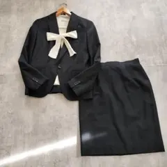 クリーニング済み美品　オフィス　ビジネススーツ 黒 ブラックM相当