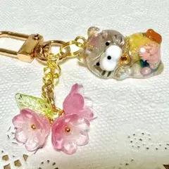 猫　チャーム　〜かすみ草のドライフラワー入り　オレンジ色