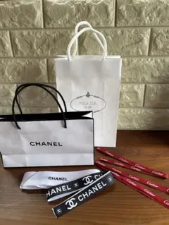 CHANEL PRADA ロゴ入り紙袋 CHANEL cartierリボンセット