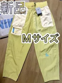 新品 NIKE ウィメンズ Mパンツ ズボン 黄色 ナイロン レディース