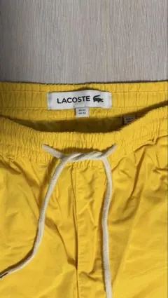 LACOSTE イエローパンツ　L〜XL ゴルフウェアのサムネイル