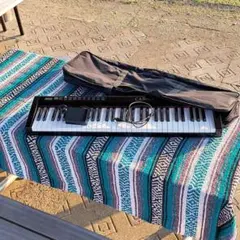 中古 Carina 電子キーボード 61鍵盤 ケース・ペダル付 現状品のサムネイル