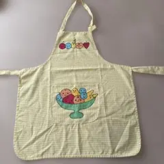 黄色いギンガムチェック柄のエプロン